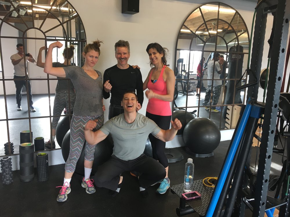 Jesse Gaynor with clients in the training studio