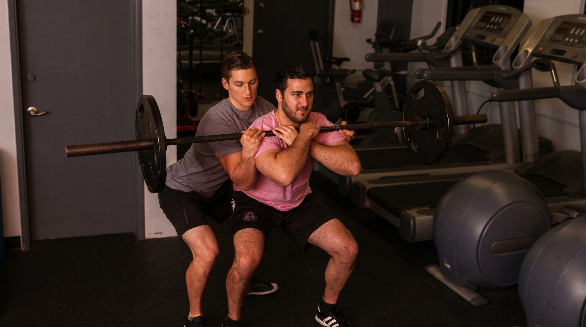 Executive performing strength training